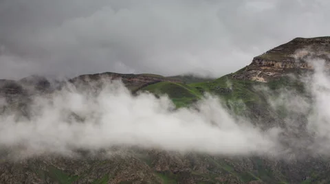 The formation  of clouds up to the slopes of the mountains of Caucasus Video stock 66762335