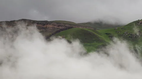 The formation  of clouds up to the slopes of the mountains of Caucasus Stock Footage 66762452