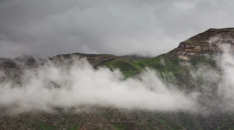 The formation of clouds up to the slopes of the mountains of Caucasus 스톡 동영상 66763239