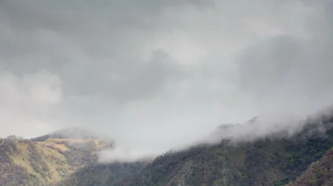The formation  of clouds up to the slopes of the mountains of Caucasus Stock Footage 66763353