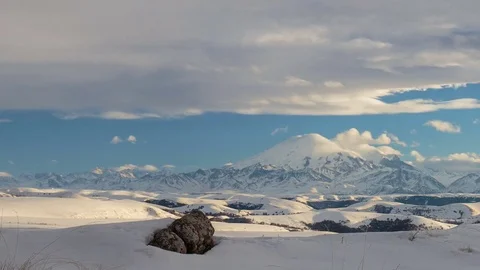 Formation of clouds in the winter in the Caucasus Mountains above the Elbrus Stock Footage 74074435