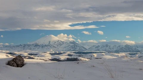 Formation of clouds in the winter in the Caucasus Mountains above the Elbrus Stock Footage 74074481