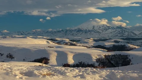 Formation of clouds in the winter in the Caucasus Mountains above the Elbrus Stock Footage 74074863