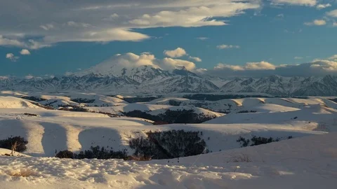 Formation of clouds in the winter in the Caucasus Mountains above the Elbrus Stock Footage 74074898