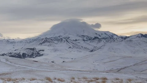 Formation of clouds in the winter in the Caucasus Mountains above the Elbrus Stock Footage 74075390
