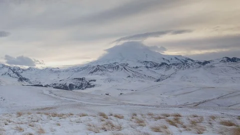 Formation of clouds in the winter in the Caucasus Mountains above the Elbrus Stock Footage 74075532