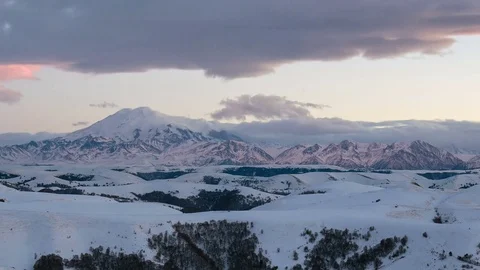 Formation of clouds in the winter in the Caucasus Mountains above the Elbrus Stock Footage 74103221