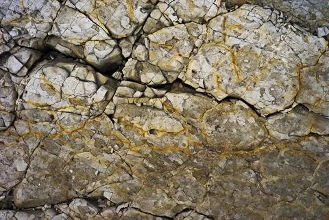 Formation of a cracked layers of rocks Stock Photos