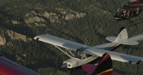 Formation Flying Micro Jet, Huskies,  Helicopter Bundle 2 - 4096 x 2160- Stock Footage 221237368