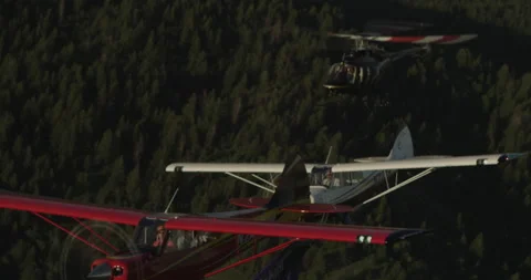 Formation Flying Micro Jet, Huskies,  Helicopter Bundle 1 - 4096 x 2160 Stock Footage 221240301