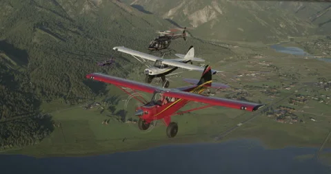 Formation Flying Micro Jet, Huskies,  Helicopter Bundle 3 - 4096 x 2160 Stock Footage 221241434