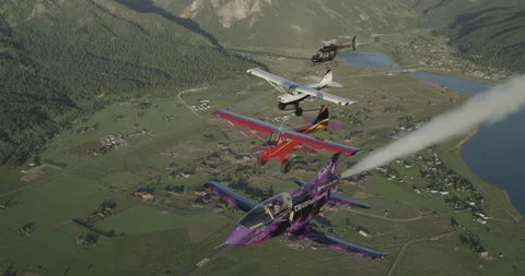 Formation Flying Micro Jet w After Burner, Huskies, Helicopter Bundle 3 - 40 Stock Footage 221232448