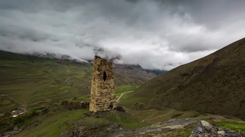 Formation of rain clouds over the gorge of the Valley Fiagdon. Stock Footage 50682051