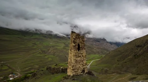 Formation of rain clouds over the gorge of the Valley Fiagdon. Stock Footage 50682169