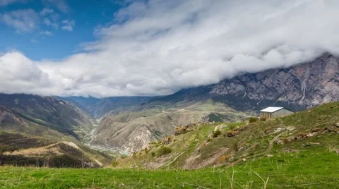 Formation of rain clouds over the gorge of the river Ardon. Stock Footage 50685441