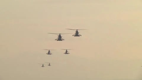 Formation of six IAR-330 PUMA helicopters flying in the airspace rushing to Stock Footage 146520159