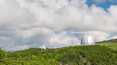 The formation of storm clouds over the mountains. Observatory. Stock Footage 52633779