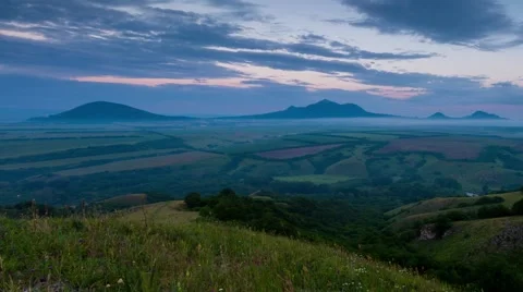 The formation of storm clouds over the mountains. Sunset. Stock Footage 52692205