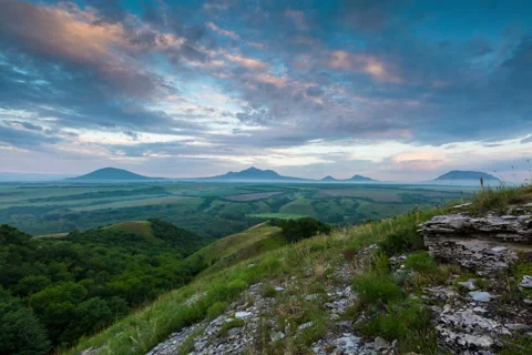 The formation of storm clouds over the mountains. Sunset. Stock Footage 52717988