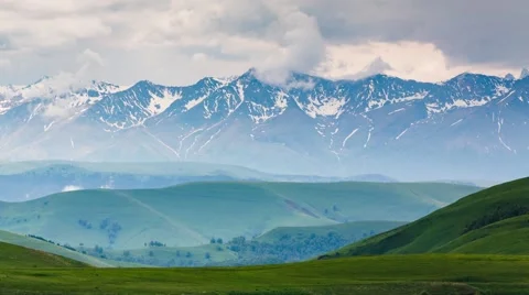 The formation of storm clouds over the mountains. 스톡 동영상 52772432