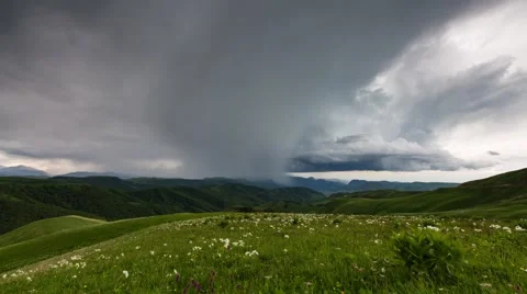 The formation of storm clouds over the mountains. Stock Footage 52772625