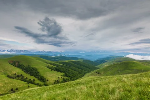 The formation of storm clouds over the mountains. 스톡 동영상 52772995