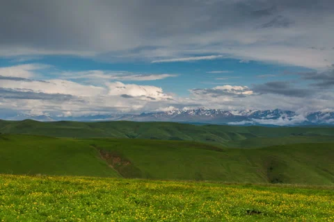 The formation of storm clouds over the mountains. Video stock 52773831