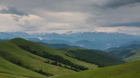 The formation of storm clouds over the mountains. 스톡 동영상 52775232