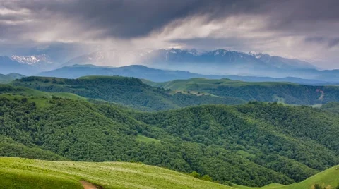 The formation of storm clouds over the mountains. Stock Footage 52776886