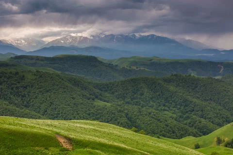 The formation of storm clouds over the mountains. Stock Footage 52778304
