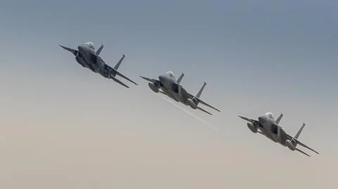 Formation of three fighter jets Stock Photos