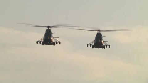 Formation of two IAR-330 PUMA helicopters flying in the airspace rushing to Stock Footage 146520095