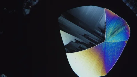 The formation of vitamins crystals under Microscope timelapse Stock-Footage 88673070