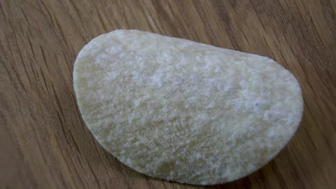 Formed Potato Crisp Rotating, Macro View of Surface and Curvature Vídeo Stock 345426701