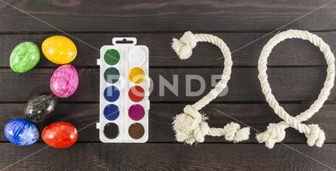 Formed the year: 2020 with eggs, watercolors and ropes. Stock Photos