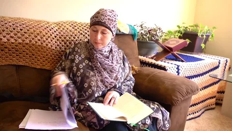 Former-Christian converted into Islam and learning to Islam in US Stock Footage 82348515