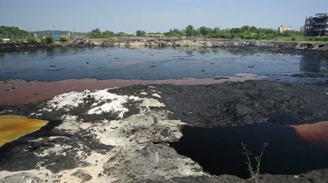 The former dump toxic waste in Ostrava, oil lagoon, Ostramo Stock Footage 59560760