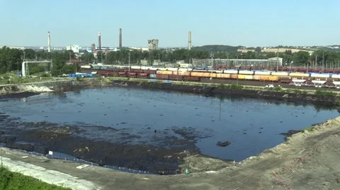 The former dump toxic waste in Ostrava, oil lagoon, Ostramo Stock Footage 59729193
