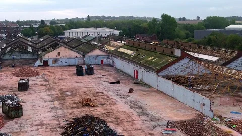 Former Glen Dimplex warehouse demolition aerial view circling the factory site Stock Footage 345407951