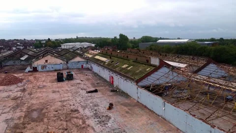 Former Glen Dimplex warehouse demolition aerial view towards factory site Stock Footage 345409352