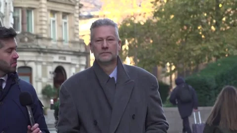 Former MEP arrives at the Old Bailey for sentencing over accepting Russian brib Stock Footage 321532364