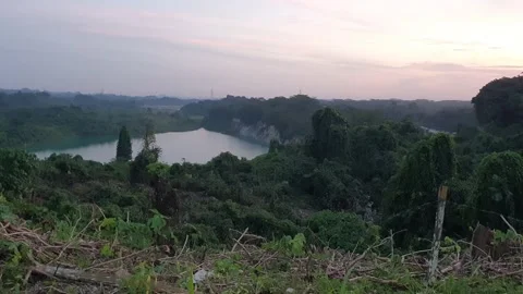 Former open pit coal mine becoming lake Video stock 231389482