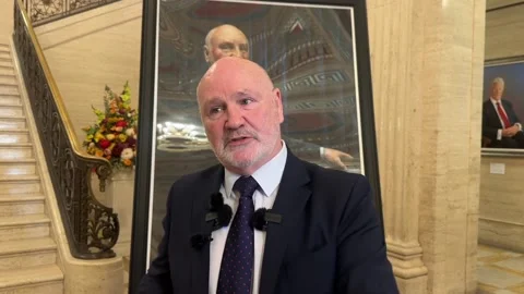 Former Speaker Alex Maskey honoured with portrait at Parliament Buildings Stock Footage 321765307