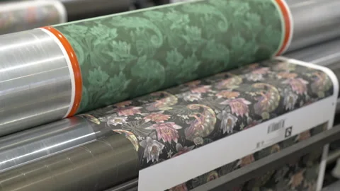 Forming design on paper sheet to create colored cover Stock Footage 296576822