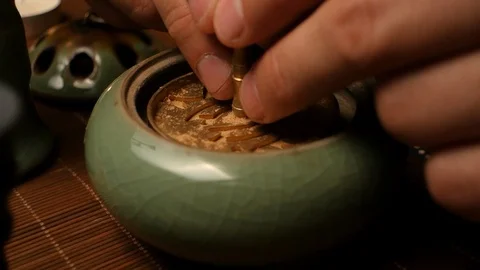 Forming a figure of incense Stock Footage 107822556