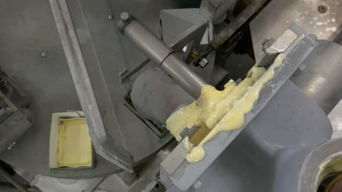 A Forming Machine for Butter at the Factory Stock Footage 97140464