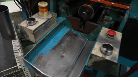 Forming machine ejects freshly rolled steel tube for fire extinguisher body Stock Footage 347719835