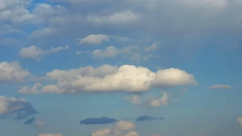Forming puffy clouds dramatic sky fast motion picturesque day time-lapse Stock Footage 74529473