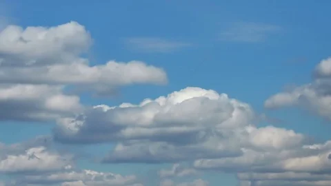 Forming puffy clouds dramatic sky fast motion picturesque day time-lapse Stock Footage 74555360