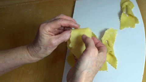 Forming shortbread cookies from thin dough - faworki Video stock 168686296